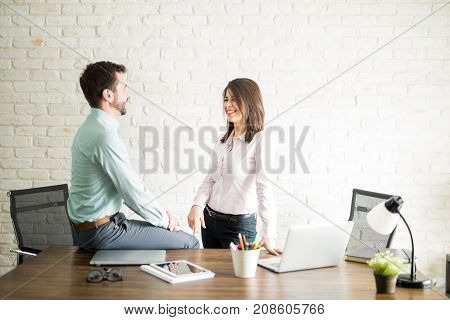 Woman Flirting With Her Coworker