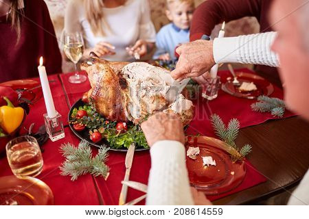 Tasty baked chicken on vegetables pillow. Ready for holidays table. Close-up of delishious chicken with vegetables. Food concept.