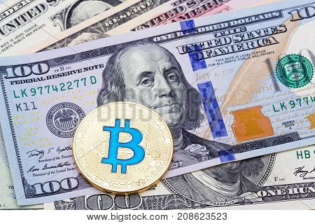 Closeup of golden blue bitcoin, macro shot. High resolution photo.