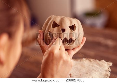 Woman Doing On A Pumpkin Face Jack