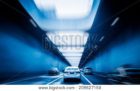 Tunnel viewed through car point of view,shanghai,china,blue toned.