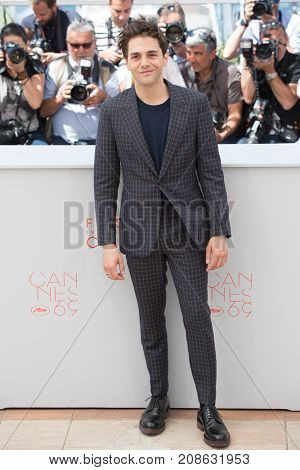 CANNES, FRANCE - MAY 19, 2016: Xavier Dolan attends the 'It's Only The End Of The World (Juste La Fin Du Monde)'  photocall during the 69th annual Cannes Film Festival at the Palais des Festivals 
