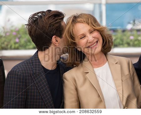 CANNES, FRANCE - MAY 19: Nathalie Baye , Xavier Dolan attend the 'It's Only The End Of The World '  photocall. 69th annual Cannes Film Festival at the Palais des Festivals on May 19, 2016 in Cannes