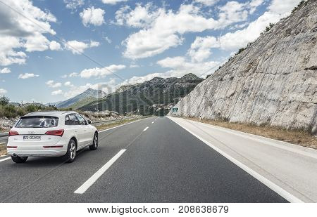 MAKARSKA, CROATIA - JULY 16, 2017: Audi Q5 driving on highway or on the Autobahn among mountain scenery.