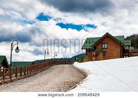 BUKOVEL, UKRAINE, March 06, 2017:  wooden houses in the Ukrainian resort Bukovel. winter landscape UKRAINE March 06 2017