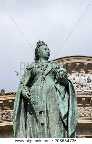 Birmingham, UK, October 3rd, 2017 : Statue of Queen Victoria in Birmingham, UK, Birmingham city council in the background.