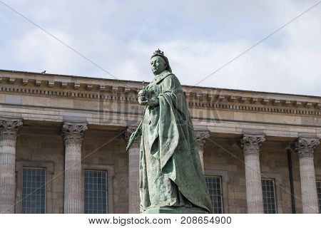 Birmingham, UK, October 3rd, 2017 : Statue of Queen Victoria in Birmingham, UK, Birmingham city council in the background.
