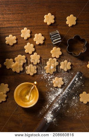 Diwali special festive food is being prepared. Homemade cookies rolled and ready to deep fry.