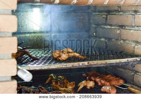 Brazilian Meat Grilling At A Churrasco