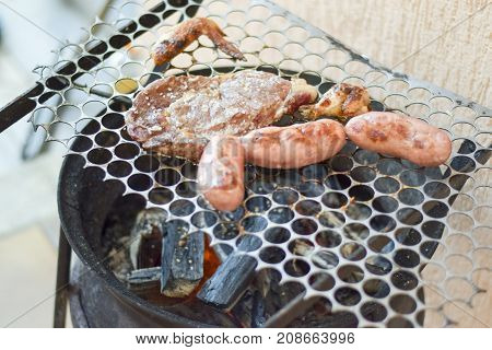 Brazilian Meat Grilling At A Churrasco