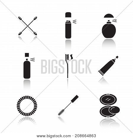 Cosmetics accessories drop shadow black glyph icons set. Earsticks deodorant bottles perfume toothbrush toothpaste hair scrunchy mascara rouge. Isolated vector illustrations