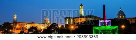 Delhi India. Illuminated Rashtrapati Bhavan an Parliament building in Delhi India. Car traffic trail lights. Dark sunset sky