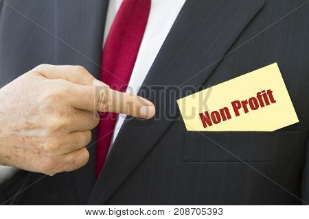 Businessman showing a card with text NON PROFIT.