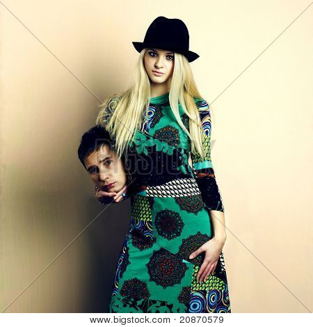Young attractive couple. Handsome man and sexy woman. Absurd photo
