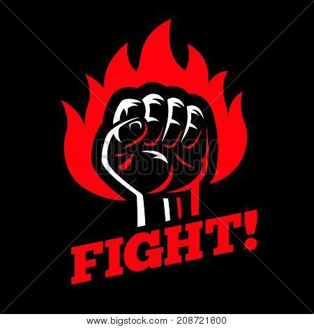 Clenched raised fist in fire on dark black background. Protest and fight strike poster symbol concept
