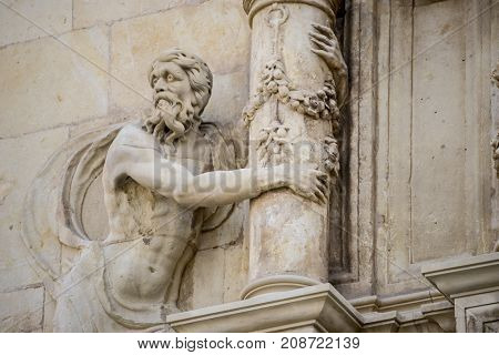 Details of stone sculptures of the facade of the University of AlcalÃÂ¡ de Henares. Madrid, Spain