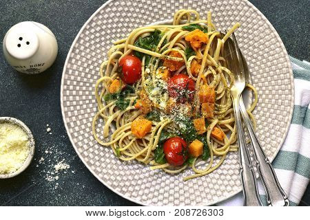 Whoolegrain Spaghetti With Spinach,pumpkin And Tomatoes.top View.