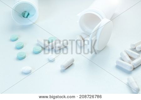 White Pills Capsules Spillage