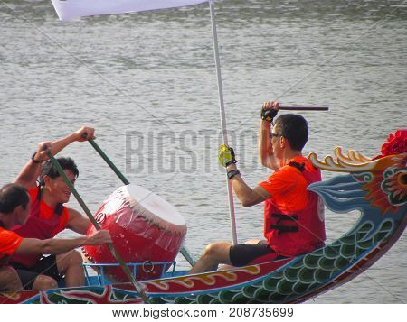 Taipei Taiwan, 20 June 2015: Closeup view of a drum and drummer at Dragon boat festival race on tamsui river in Taipei