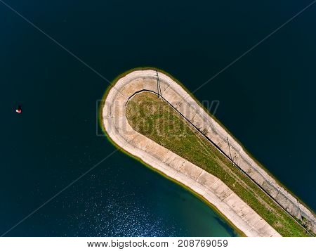 Aerial view breakwater at sea, cutwater, pier, groyne mole