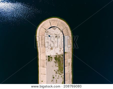 Aerial view breakwater at sea, cutwater, pier, groyne mole