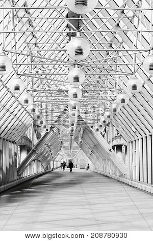 Moscow a bitter park St. Andrew's Bridge summer 2017. People walk onthe bridge in the early morning