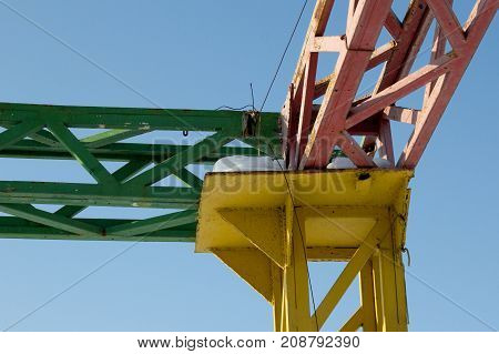 Colored metal construction on blue sky background