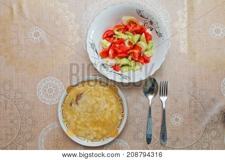 Erishde dish badumcan stuffed dish and cucumber tomato salad