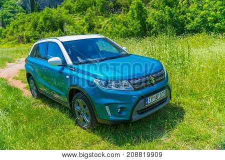 Montenegro, Prokletije Mountains - May 29/2017: Tourists In Suzuki Vitara Car Went On A Trip To The