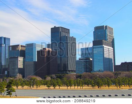 Tokyo City Building Skyline Marunouchi Area with Imperial Palace East garden financial district cityscape