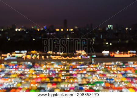 Muliple colour night weekend roof top blurred bokeh light abstract background