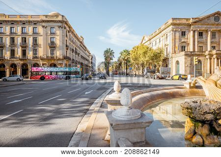 BARCELONA, SPAIN - August 16, 2017: View on the wide avenue called Passeig de Colom with fountain in Barcelona city