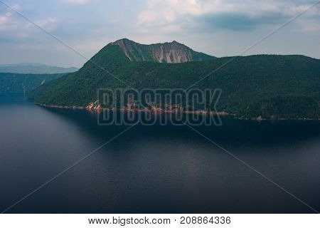 Mount Kamui and the beautiful clear blue Lake Mashu, Hokkaido, Japan