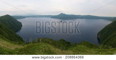 Mount Kamui and the beautiful clear blue Lake Mashu, Hokkaido, Japan