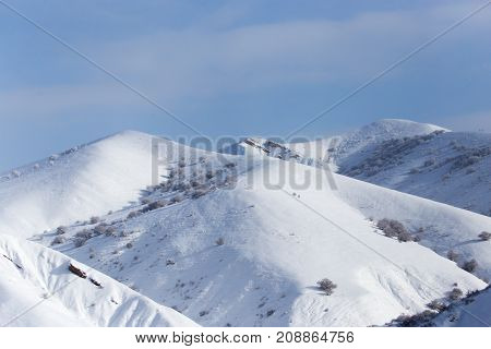 snowy slopes of the Tien Shan Mountains