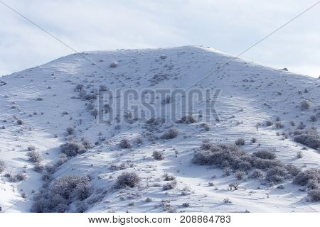 snowy slopes of the Tien Shan Mountains