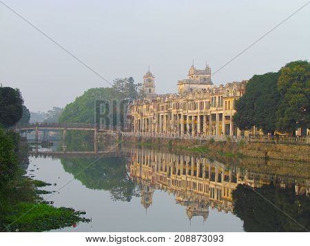 Day view of Chikan village riverbank with water reflection in Kaiping Guangdong China
