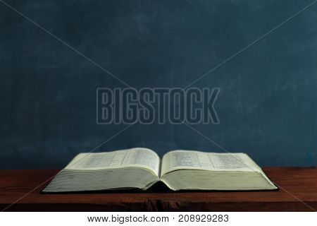 Bible on an old table. Beautiful background.Religion concept.