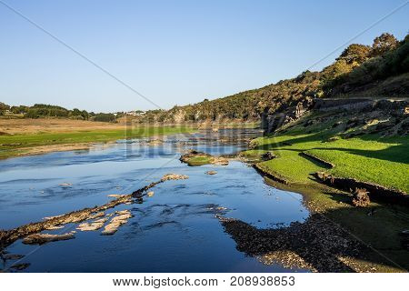 Bottom of a dry reservoir in Portomarin Northern Spain.