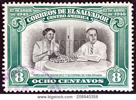 EL SALVADOR - CIRCA 1948: A stamp printed in El Salvador issued for the 3rd death anniversary of Franklin D. Roosevelt shows President and Eleanor Roosevelt, circa 1948.