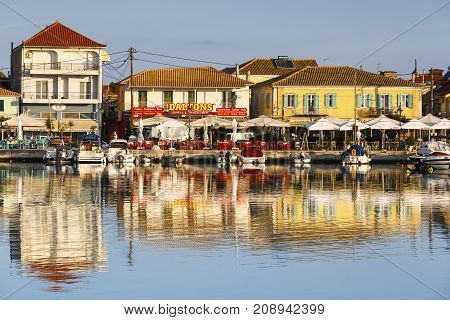 NYDRI, GREECE - OCTOBER 2, 2017: Coffee shops and restaurants in the harbour of Lefkada town, Greece on October 2, 2017.