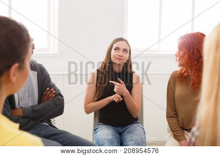 Meeting of support group. Happy woman talking about her life, everything good. Mental health, psychotherapy concept