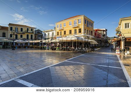 NYDRI, GREECE - OCTOBER 2, 2017: Coffee shops and restaurants in the main square of Lefkada town, Greece on October 2, 2017.