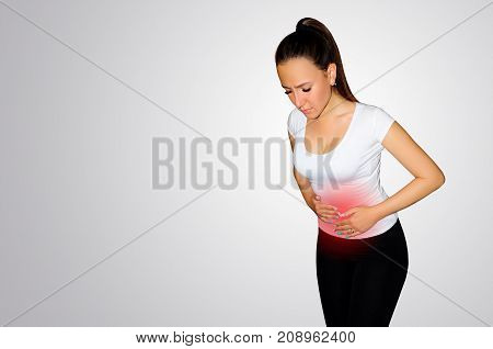 Abdominal Pain. A Young Woman Suffers From Pain In The Abdomen. The Problem With Digestion. The Prob
