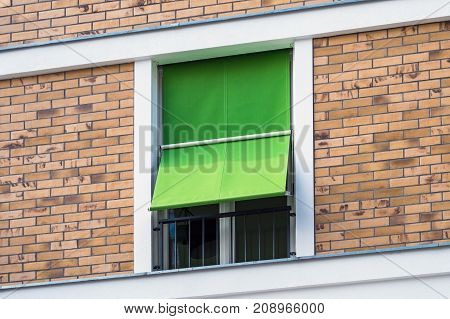 Window With Outdoor Sunblinds , Fabric Blinds On Window Exterior