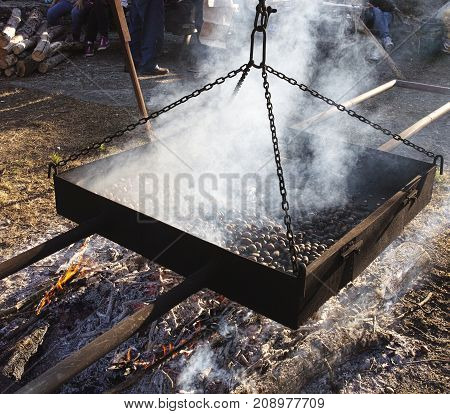 Cooking Chestnuts On Burning Coals