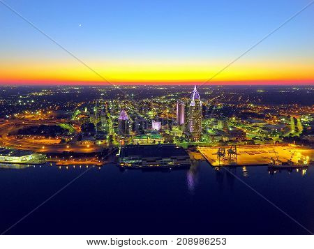Port city. Riverside Downtown Mobile, Alabama at twilight