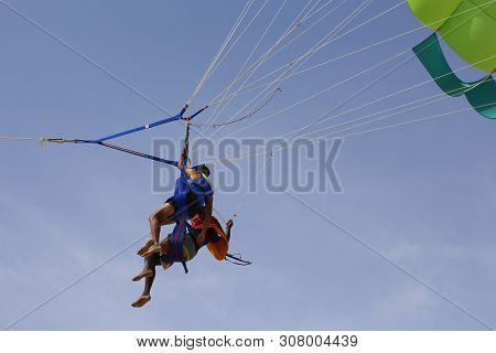 Paraglider With A Saddle For People. Parasales - Water Parachutes. Bright Colours.