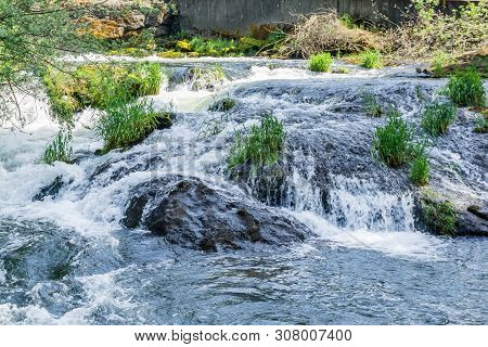 A View From Downstream  At Tumwater Falls In Tumwater, Washington.