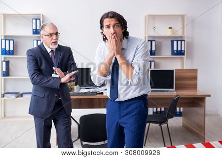 Forensic investigator investigating theft in the office